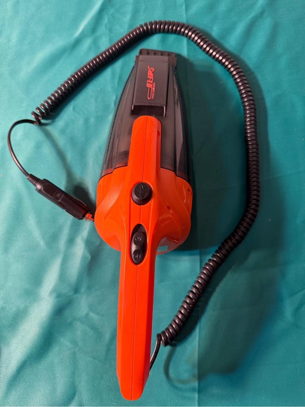 Compact Handheld Car Vacuum in Orange and Black